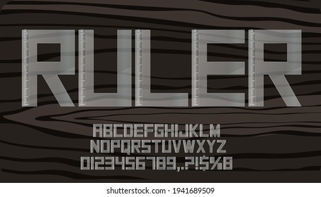 Plastic ruler alphabet texture with numbers isolated on dark background. 