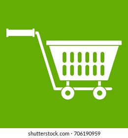 Plastic shopping trolley icon white isolated on green background. Vector illustration