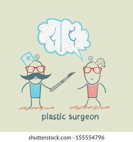 plastic surgeon says with a patient about breast augmentation