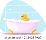 Plastic toy yellow duckling floats in the bathtub, children's bathroom toy