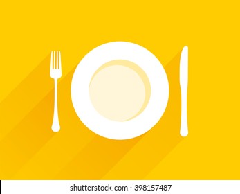 Plate with cutlery on a yellow background