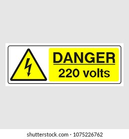 Plate: "Danger. 220 Volts". Sign: "Danger. 220 Volts" on a gray background