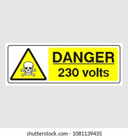 Plate: "Danger. 230 Volts" (Panoramic sign). Sign: "Danger. 230 Volts" (Panoramic sign) on a gray background