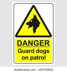 Plate: "Danger Guard Dogs On Patrol". Sign: "Danger Guard Dogs On Patrol" on a gray background