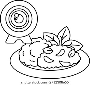 Un plato de comida con una cámara en el fondo. La cámara es una cámara web y la comida es una ensalada