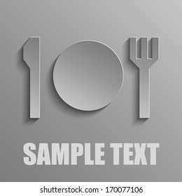 Plate and fork and knife on a gray background