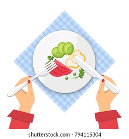 Plate of fresh vegetable salad on tablecloth.