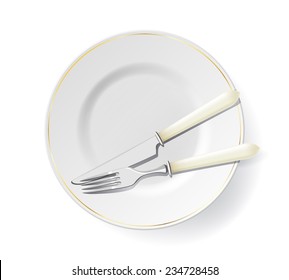 Plate with golden line decor, with fork and knife on it isolated on white. Dinner set. End of meal.