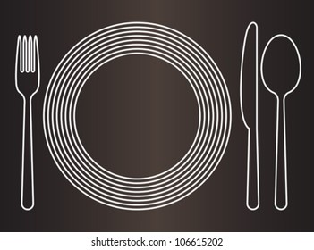 Plate, knife, spoon and fork