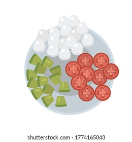 Plate with sliced tomatoes, avocado and mozzarella. Ingredients for the salad.