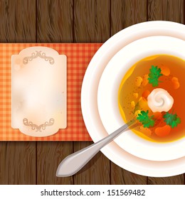 A plate of soup on a wooden table. View from above. Rustic style. The idea to design a menu. Place for your text