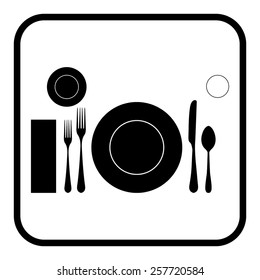 plate with spoon, knife and fork