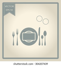 plate with spoon, knife and fork 