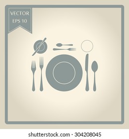 plate with spoon, knife and fork 