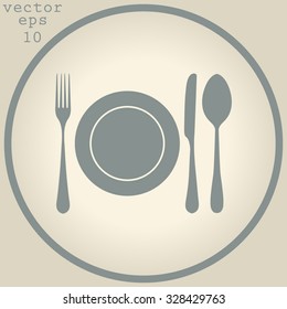 plate with spoon, knife and fork