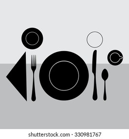 plate with spoon, knife and fork 