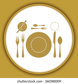 plate with spoon, knife and fork