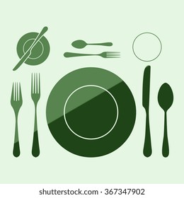 plate with spoon, knife and fork 