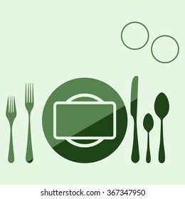 plate with spoon, knife and fork