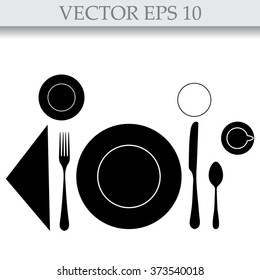 plate with spoon, knife and fork 