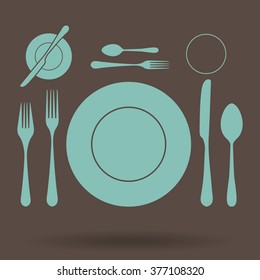 plate with spoon, knife and fork 