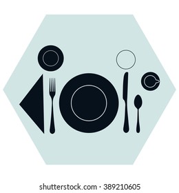plate with spoon, knife and fork 