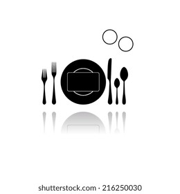 plate with spoon, knife and fork with shadow