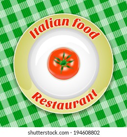 Plate with title and tomato on a green background