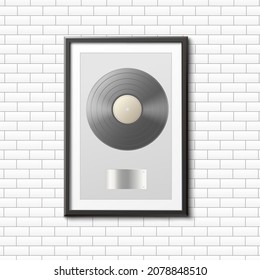 Platinum music award in a wooden frame hanging on a brick wall, realistic vector illustration. Template of platinum record musical vinyl