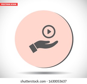 Play in the hand icon , lorem ipsum Flat design
