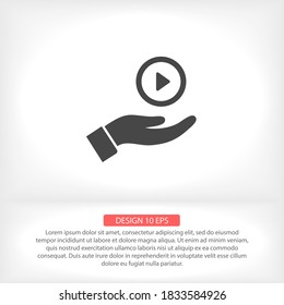 Play in the hand icon , lorem ipsum Flat design