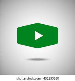 Play icon. Flat style. Grey background. Symbol for web design and mobile. Vector illustration.