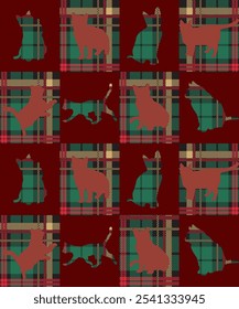 Playful cat silhouettes arranged on traditional tartan plaid background in festive red and green colors. Perfect for holiday season designs and Christmas decorations.