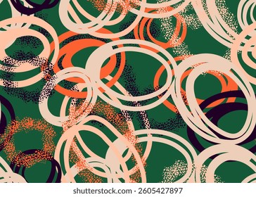 Playful colorful seamless vector pattern with hand drawn overlapping circles in white, orange, and black on a  green background. Textured details add depth, ideal for modern designs, textiles