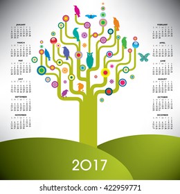 A playful and colorful tree calendar for 2017