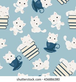 Playful kittens seamless pattern. White cats on blue background