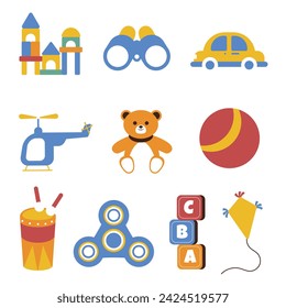 A playful set of children’s toys including blocks, a teddy bear, and a toy helicopter.