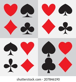 Playing card suits: four different types of design. Vector illustration
