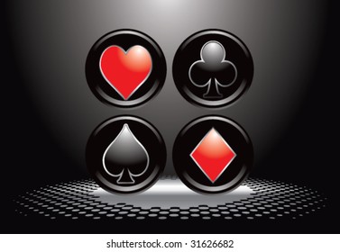 playing card suits under spotlight