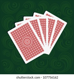 playing cards back sides on green background