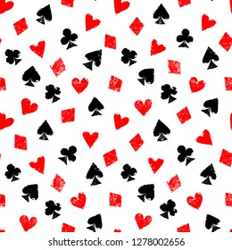 Playing cards different suits - hearts, diamonds, spades and clubs - grunge seamless pattern, vector