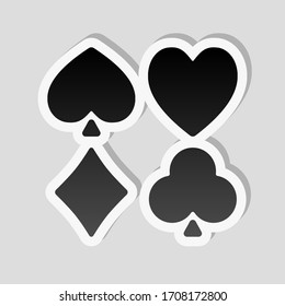 Playing cards. Hearts, spades, diamonds, clubs. Sticker style with white border and simple shadow on gray background