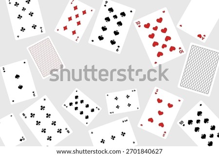 Playing cards scattered on gray background poker deck pattern