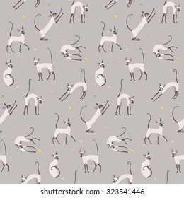 Playing cats on grey background. Seamless pattern for your design.