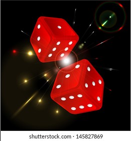 playing dice of red color on a black background 