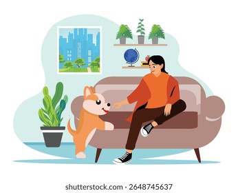 Playing with pet. A young woman sits on a sofa and plays with a pet dog.