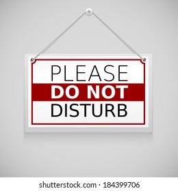 Please do not disturb, sign hanging on the wall