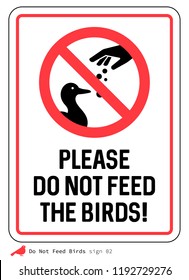 'Please Do not feed the birds' sign. Ducks.