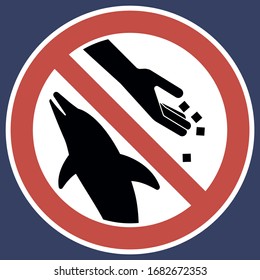 Please do not feed the dolphins.
Information sign prohibiting certain actions in this territory.