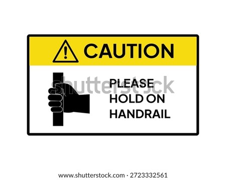 Please hold on handrail. The label recommends always holding on when riding public transportation, especially for standing passengers.